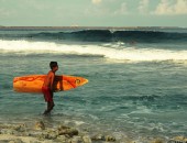 Boy surfing Cheap flights to Gran Canaria: Surfing