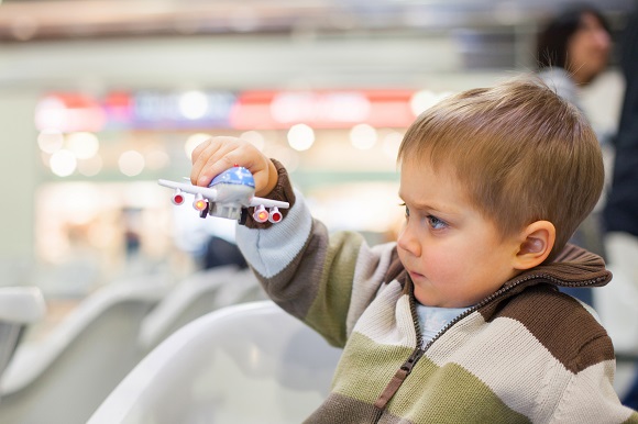 Young child airport plane